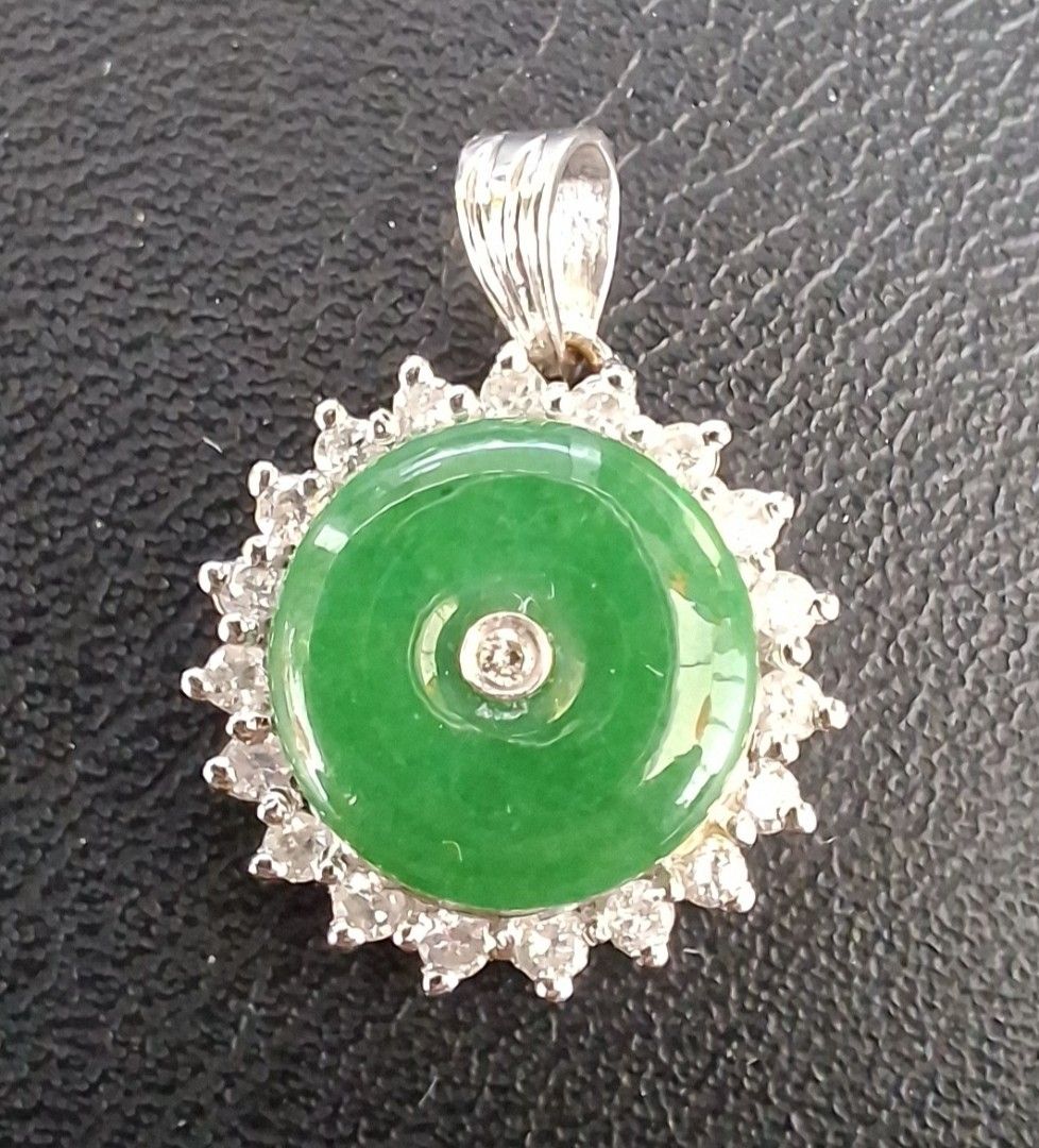 Jade Pendant With Diamonds (Category: Charms) located in Singapore. Submitted by antiquelover33 (Listing ID 1418797546, Image 2). Description: Type A Jadeite From Myanmar Sets With 18k White Gold & Diamond Imperial Green Jadeite Highly Translucent Total Weight 2.22 gm Purchased At $2800 Gemologist Certificate Provided Please View My Other's Ads Too.