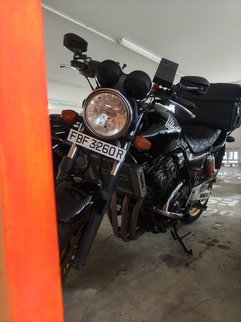 CB400 REVO 1 COE SEP 2030 (Category: Class 2A) located in Singapore. Submitted by jiahuiij (Listing ID 1413724557, Image 2). Description: 2011 CB400 Revo 1 (Yoshimura R77) MILEAGE 105K COE SEP 2030 ROAD TAX 12 MAR 2026 Maintained regularly by panjang Parts replaced: Chain & Sprocket - Nov 2023 Yuasa battery - May 2024 Speed sensor - May 2024 Magnetic coil - March 2025 Spark plugs x4 - March 2025 New brake pads and serviced brake pump - Dec 2025 N