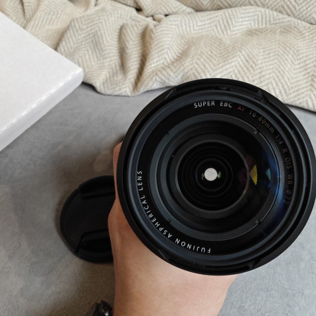 Fujinon XF 16-80mm f/4 R OIS WR Lens (Category: Lens & Kits) located in Singapore. Submitted by techhaven (Listing ID 1422819260, Image 1). Description: Comes with box, lens hood, cap and uv filter. Unfortunately has fungus which may cause slight artefact in picture - can't see the fungus from the lens itself have to take picture. Letting go as lazy to get it cleaned. Feel free to bring your camera to test before purchase. Meetups at Clementi.