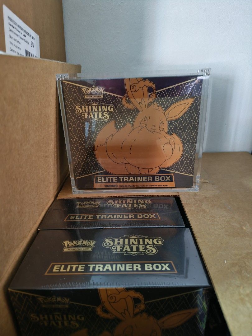 Pokemon Shining Fates Elite Trainer Box with Acrylic case (Category: Card Boxes & Cases) located in Singapore. Submitted by card.aura (Listing ID 1422722383, Image 3). Description: - Sealed Pokemon Shining Fates Elite Trainer Box - Include Acrylic case - Includes booster packs - Comes with card sleeves, dice, and player's guide - Perfect for collectors and players Just ETB only 160 **free delivery with 2 boxes or more purchase**.