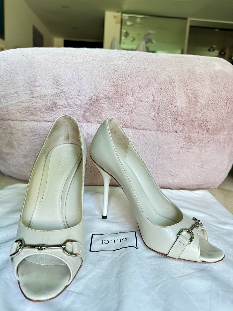 Gucci Peep-Toe Heels - Size 38 (Category: Heels) located in Singapore. Submitted by emilylove (Listing ID 1425674979, Image 1). Description: ✨ Authentic Gucci Leather Heels – Elegant Classic ✨ A beautiful pair of Gucci open-toe leather heels in a timeless cream/ivory shade, featuring the iconic Gucci horsebit hardware. Sophisticated and versatile — perfect for both formal occasions and elegant everyday styling. Crafted with high-quality leather a