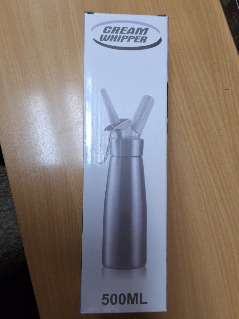 *BRAND NEW* Black 500ml Cream Whipper Dispenser (Category: Bakeware) located in Singapore. Submitted by prosperich_48 (Listing ID 1426223861, Image 1). Description: Brand new 500ml cream whipper dispenser. Comes with all original accessories, including various nozzles, a cleaning brush, and user manual. Perfect for making whipped cream, mousses, and other desserts. Ready to use! Self collection or self arranged delivery only Chat for more details