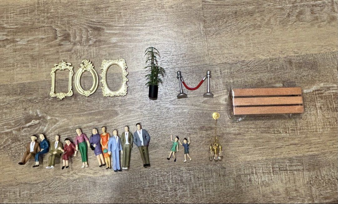 Miniature Diorama Accessories Set Doll house Museum of us miniature people gold frame plants chandelier barrier bench sitting (Category: Toy Figures) located in Singapore. Submitted by jjoul (Listing ID 1426554594, Image 1). Description: 3 Gold frame Set $1 SOLD 1 Plant $1 SOLD 1 Gold chandelier $1 SOLD 1 Bench $1 1 Barrier (silver with red string) $1.50 SOLD 1 Set of ALL miniature people $1.50 SOLD ALL measurements are given to my best ability, 