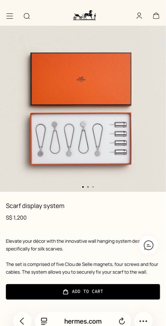 Hermès Scarf Display System (RRP S$1200) (Category: Accessories) located in Singapore. Submitted by porken (Listing ID 1427699184, Image 2). Description: Elevate your décor with this innovative wall hanging system designed specifically for silk scarves. The set includes five Clou de Selle magnets, four screws, and five cables. Securely fix your scarf to the wall with this elegant system..
