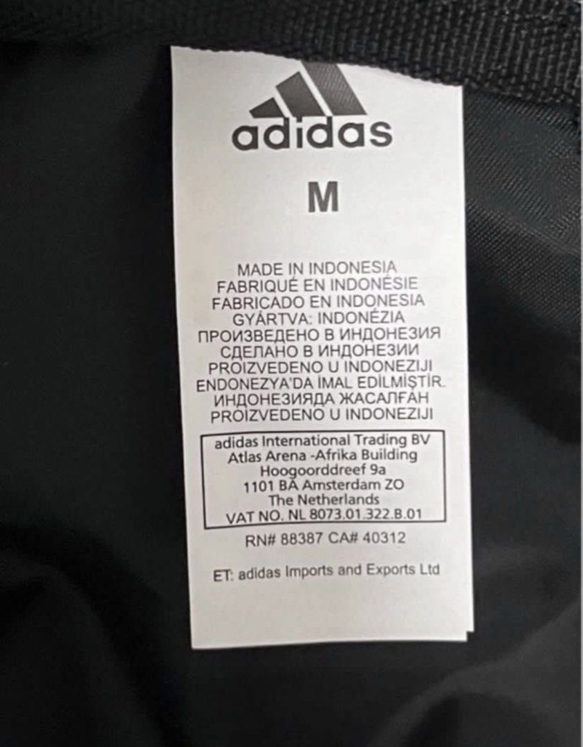 Adidas Duffle Bag (Category: Sling Bags) located in Singapore. Submitted by wallis1 (Listing ID 1428277154, Image 8). Description: Polyester nylon Height 30cm Base 57x21cm Adjustable strap 1 zip pocket & 3 inside pockets Use once like new .