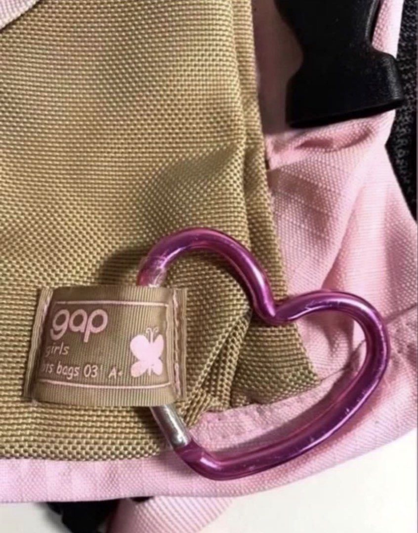 Gap Pink Backpack (Category: Backpacks) located in Singapore. Submitted by wallis1 (Listing ID 1428277796, Image 5). Description: Authentic gap 40x30x12.5cm Crossbody or sling Cushion back Earphone hole Velcro base Heart shape key ring Lightly used .