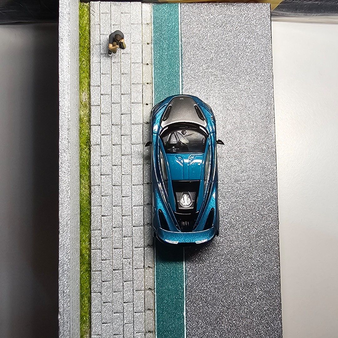 Diorama for 1:64 diecast cars (Category: Vehicle & Diecast Models) located in Singapore. Submitted by elsonjudey10724 (Listing ID 1429121814, Image 4). Description: This is a diorama made for 1:64 diecast cars.This diorama is inspired by japanese road side. Grass a bit easy to fall so need good care.Will not include car and figure..