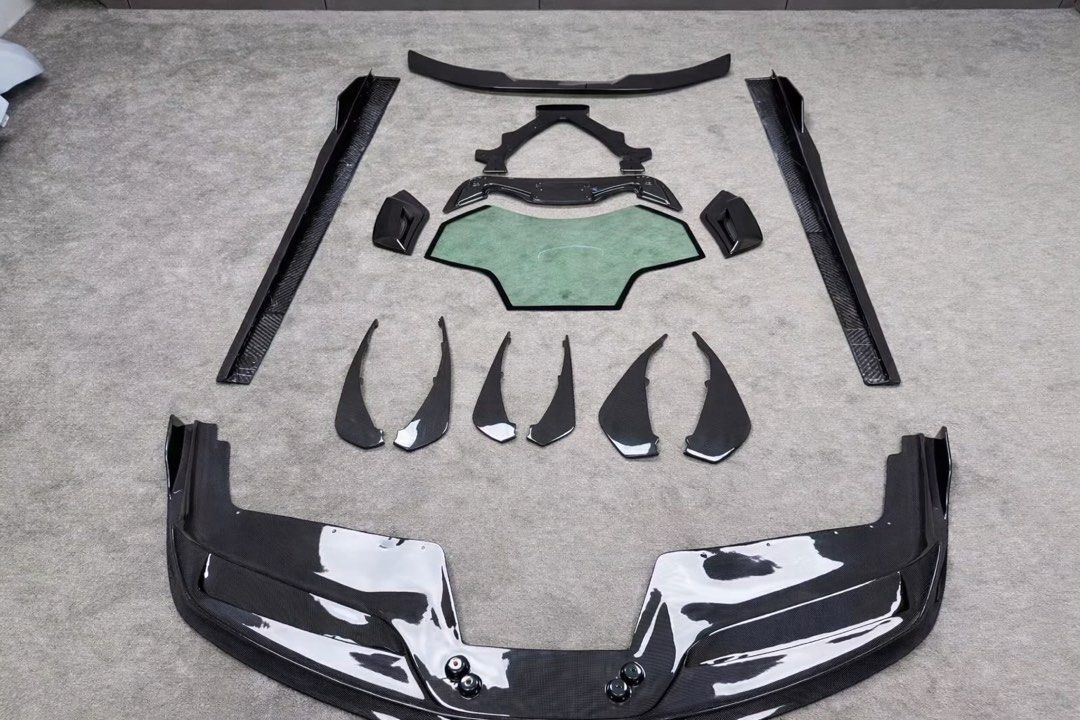 Ferrari 488 Vorsteiner Full Carbon Bodykit + Transparent Engine Cover (Category: Bodykits & Styling) located in Singapore. Submitted by 1812.motorworks (Listing ID 1424728926, Image 6). Description: Upgrade your Ferrari 488 with this stunning Vorsteiner style full carbon bodykit, paired with a transparent engine cover to showcase the beautiful Ferrari engine. Full aggressive aero styling that enhances both performance and visual presence. Package