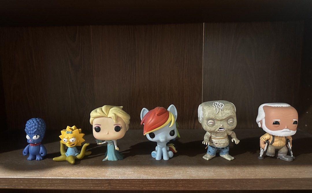 Funko Pop! Vinyl Figures - Assorted Characters (Category: Toy Figures) located in Singapore. Submitted by mooodi (Listing ID 1432988478, Image 1). Description: - Funko Pop! vinyl figure collection - Featuring characters from: - The Simpsons - My Little Pony - Frozen - The Walking Dead - Perfect for collectors and fans!.
