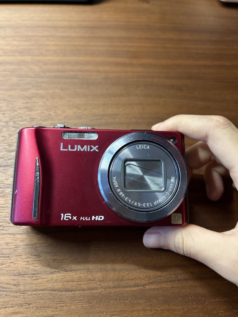 Panasonic Lumix DMC-TZ20 Digital Camera (Category: Cameras) located in Singapore. Submitted by orangeeejoose (Listing ID 1432914941, Image 1). Description: - Panasonic Lumix DMC-TZ20 camera - Includes: 2 SD cards, battery - 16x zoom - Full HD video recording - Perfect for capturing memories - Japanese menu Defects - small part of the battery lid is chipped off ref to pic - when zoomed in, some dots appear Open to nego Low ballers will be ignored 
