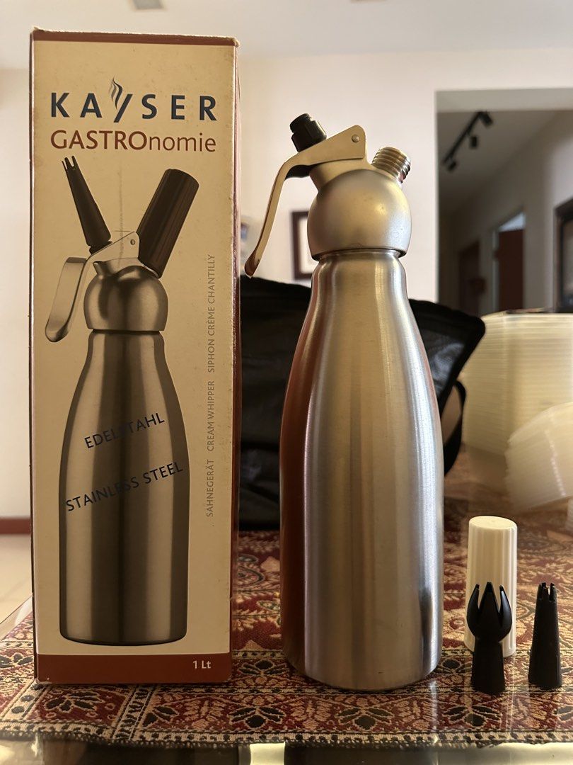 Kayser Gastronomie Stainless Steel Cream Whipper (Category: Other Kitchenware & Tableware) located in Singapore. Submitted by 9vbp69tnmh44654 (Listing ID 1433043178, Image 1). Description: Kayser Gastronomie cream whipper, 1 liter capacity. Made of stainless steel. Includes the original box and three nozzle attachments. Perfect for making whipped cream, mousses, and other culinary creations..