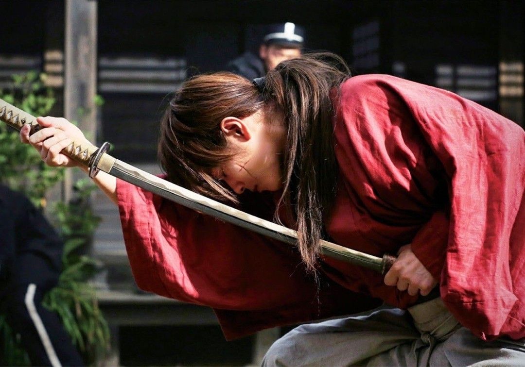 Samurai X Rurouni Kenshin Movie Version Reverse Blade (Category: J-Wave Merchandise) located in Singapore. Submitted by dianel.sim (Listing ID 1433909786, Image 2). Description: Overall Length: 104cm Blade Material : Carbon Steel, unsharpened, rat-tail tang Scabbard: Brown Glossy Lacquered Wood Scabbard Tsuba: Alloy Faux Rayskin Cotton Ito Wrapping Cotton Sageo.