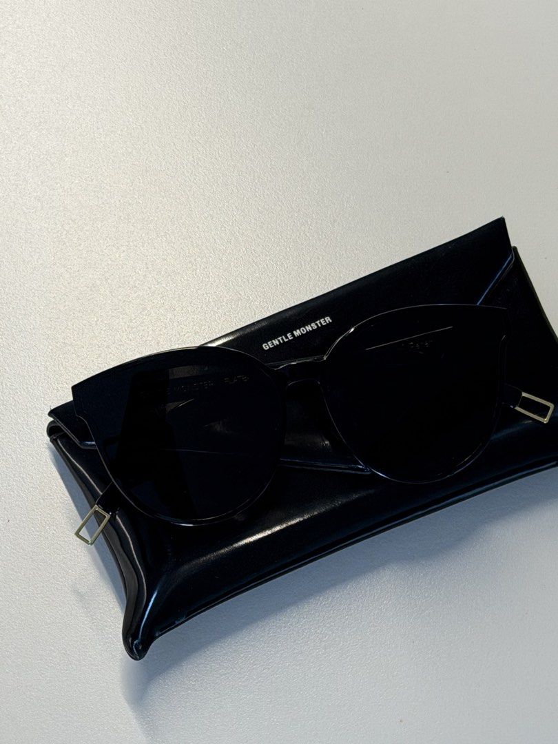 Gentle Monster Black Peter Sunglasses (Category: Sunglasses & Eyewear) located in Singapore. Submitted by number888 (Listing ID 1434055345, Image 2). Description: - Gentle Monster Black Peter sunglasses - Minimal wear - Includes original case - Adds sophistication to your style.