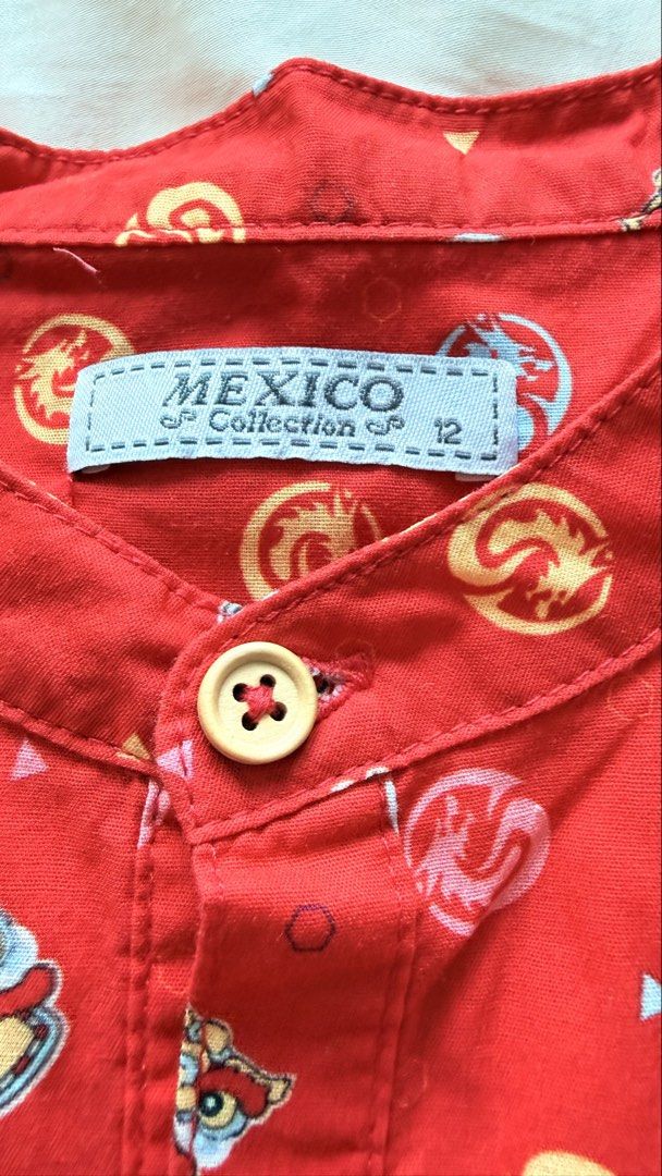 CNY Collection Red Lion Dance Shirt - Size 12 (Category: Babies & Kids Fashion) located in Singapore. Submitted by justdoitbaby (Listing ID 1434823812, Image 3). Description: - Red shirt from Mexico Collection - Lion Dance print - Mandarin collar - Button-down front - Adds a pop of color and cultural flair.