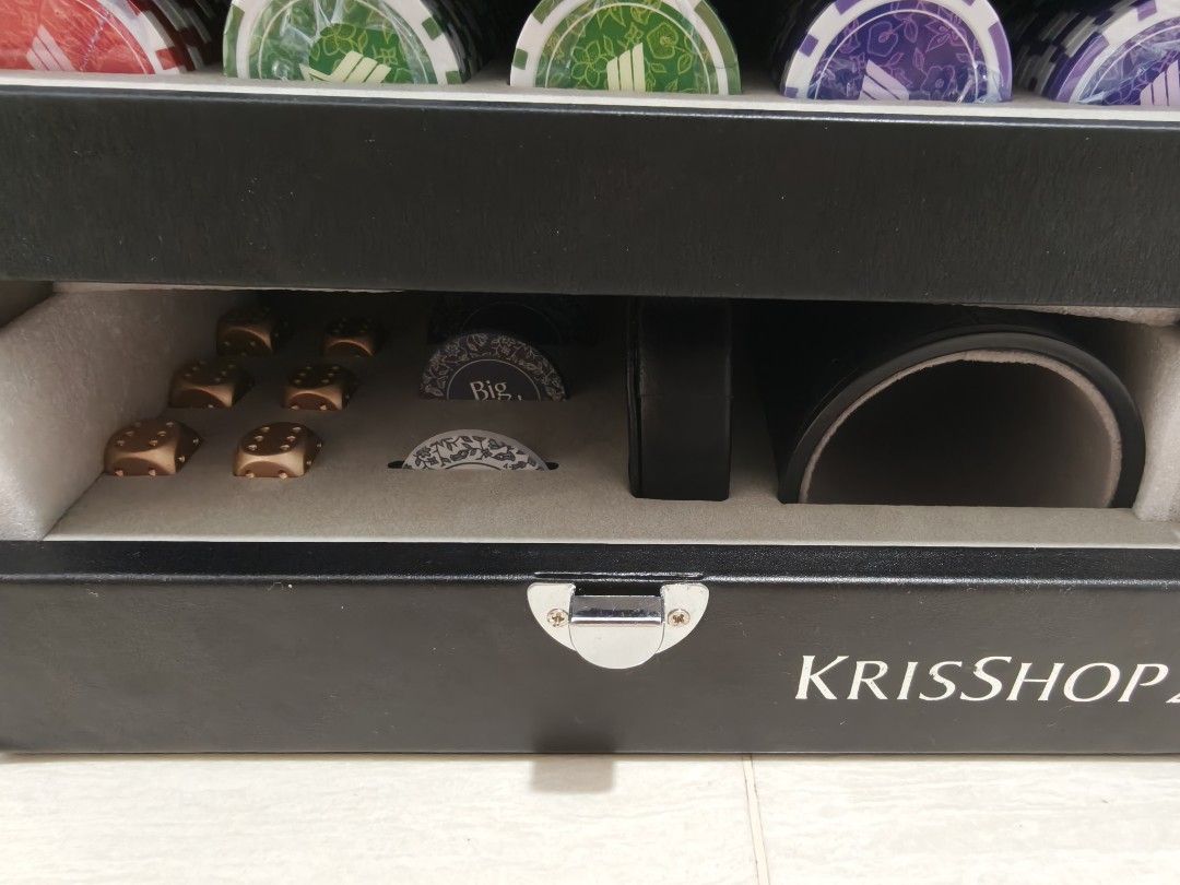Limited Edition Krisshop poker full set with chips, metal dice, shaker bowl (Category: Board Games & Puzzles) located in Singapore. Submitted by shf_dragonball_hobbyist (Listing ID 1430109799, Image 7). Description: Brand New, poker card deck and chips sealed. condition as per photo. Let go to free up space..
