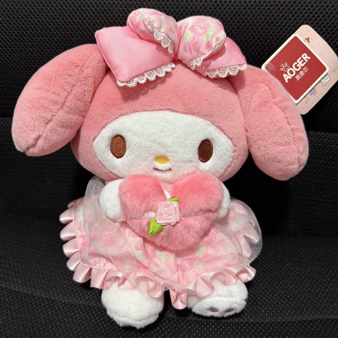 My Melody Plush Soft Toy (Category: Plushies & Soft Toys) located in Singapore. Submitted by icevanillalatte (Listing ID 1430300323, Image 1). Description: Height: 25cm Adorable My Melody plush toy, perfect for collectors or as a gift. Features a cute pink dress and a heart-shaped accessory. Comes with original tags. A licensed Sanrio product..