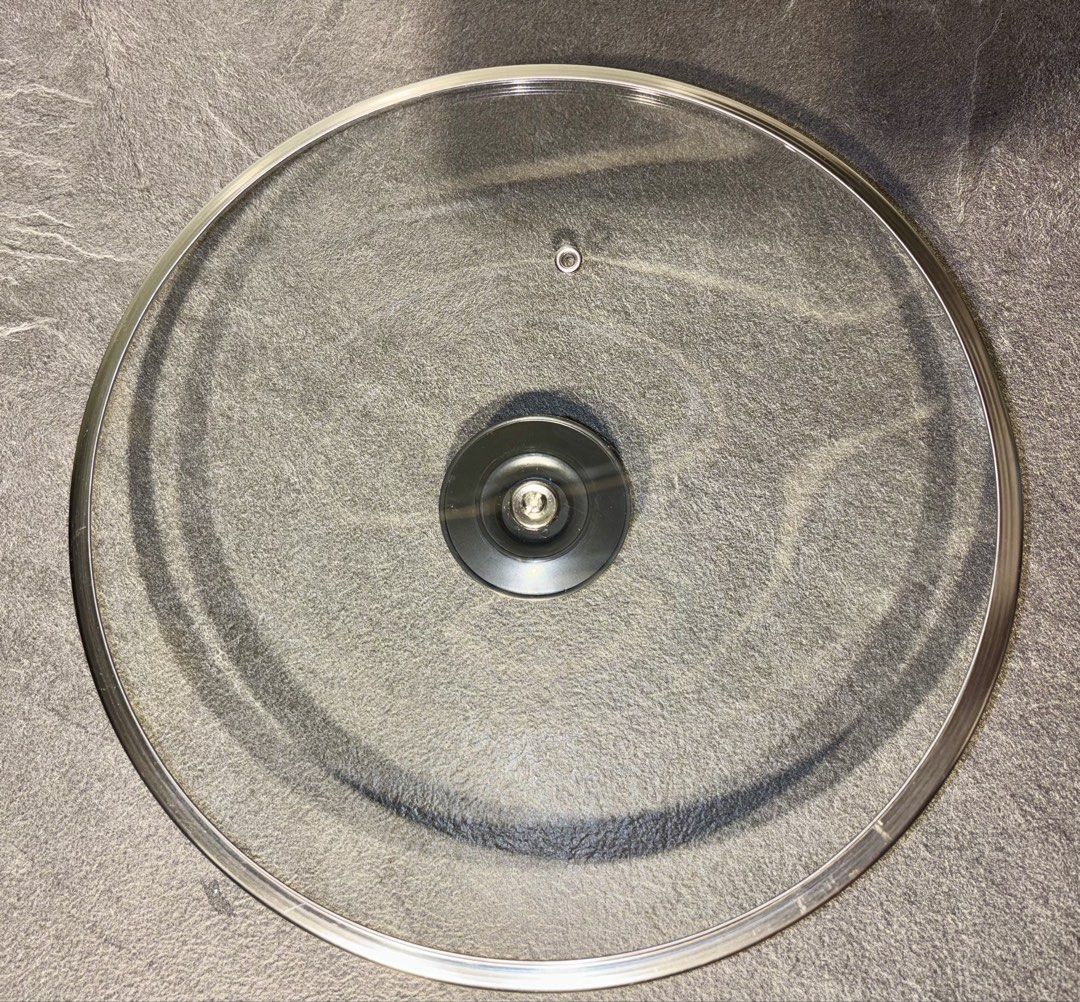 Stainless Steel Pot with Glass Lid (Category: Cookware & Accessories) located in Singapore. Submitted by liuxue3918 (Listing ID 1437481875, Image 5). Description: - Durable stainless steel pot - Clear glass lid - Sturdy handles - Excellent condition - Ideal for soups, stews, and more.