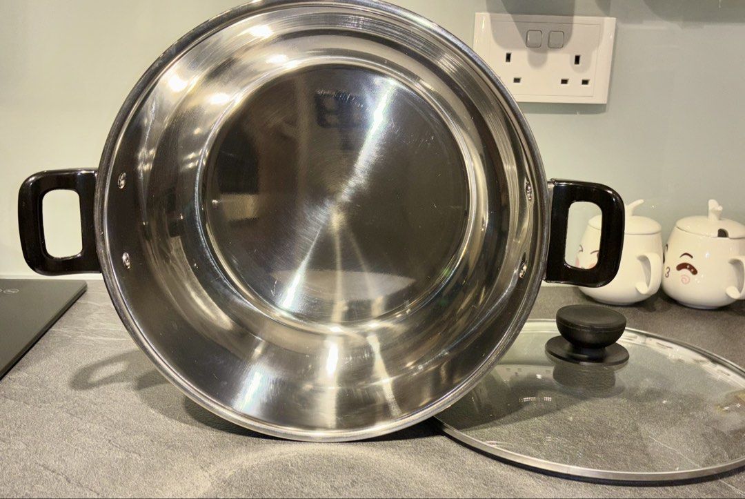 Stainless Steel Pot with Glass Lid (Category: Cookware & Accessories) located in Singapore. Submitted by liuxue3918 (Listing ID 1437481875, Image 4). Description: - Durable stainless steel pot - Clear glass lid - Sturdy handles - Excellent condition - Ideal for soups, stews, and more.
