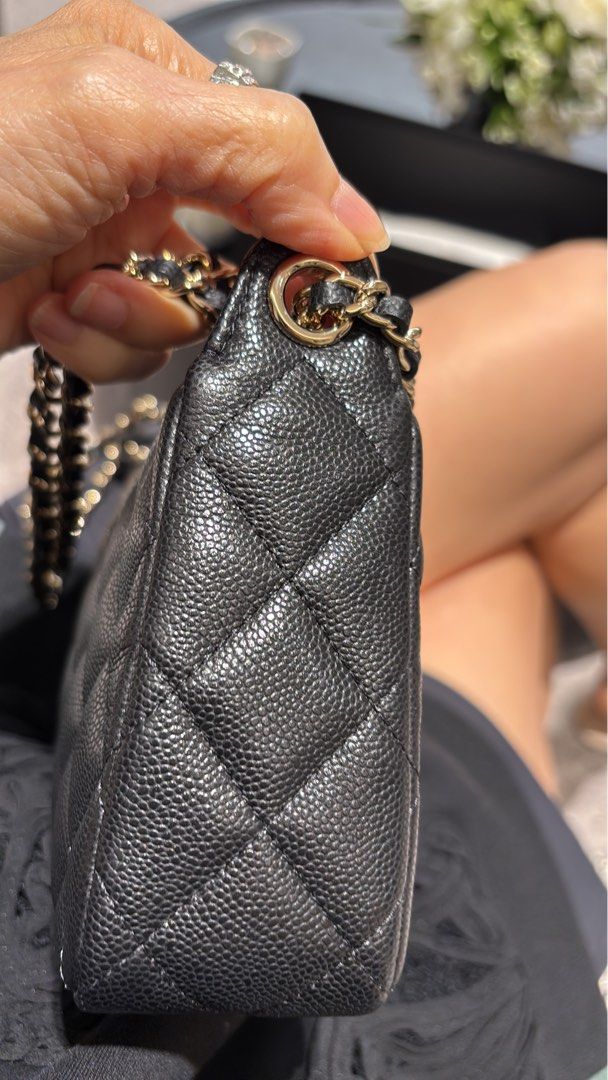 Chanel 26A clutch on chain in black carviar and LGHW model AP4704 (Category: Bags & Wallets) located in Singapore. Submitted by kelly63chong (Listing ID 1438006273, Image 4). Description: - Authentic Chanel chain wallet - Classic quilted caviar leather - Features a chain strap - Comes with original box, dust bag, and receipt - Perfect for everyday or special occasions - Purchased in Singapore.