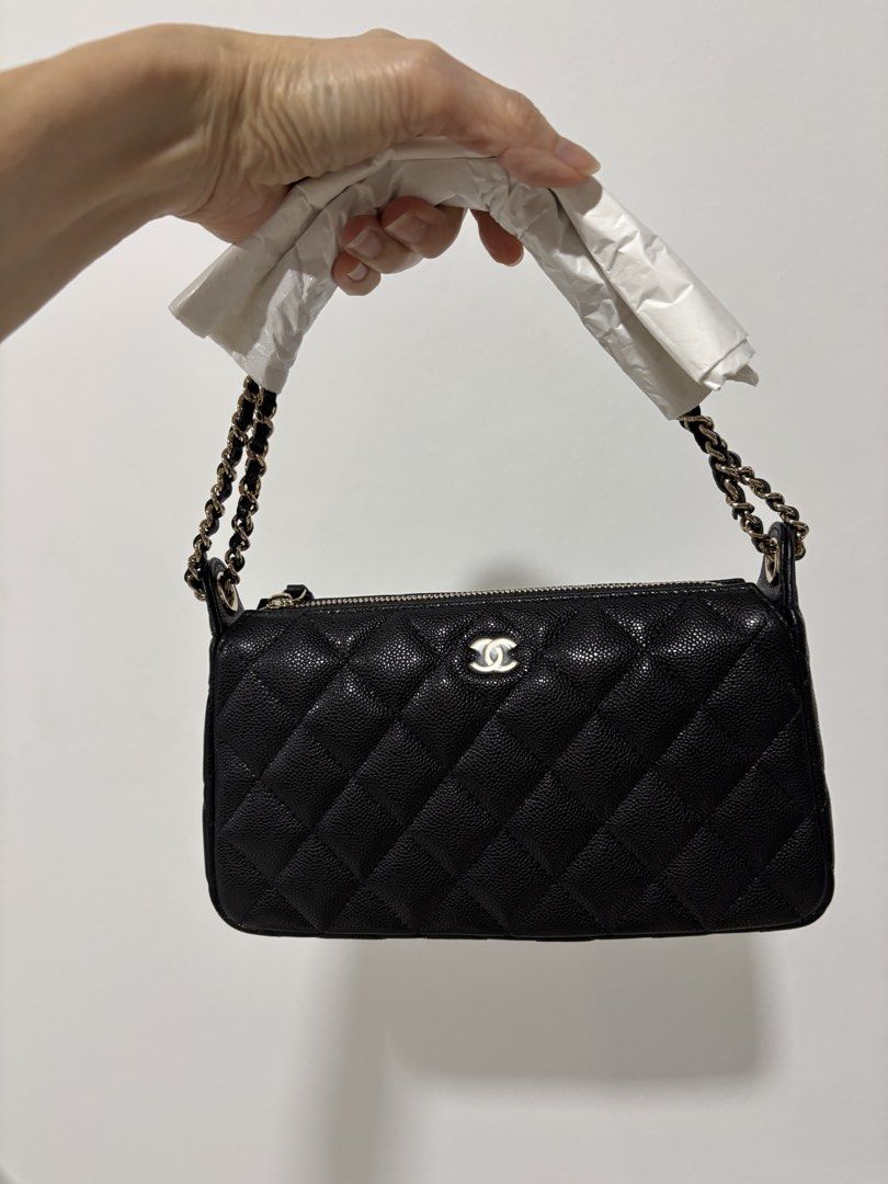Chanel 26A clutch on chain in black carviar and LGHW model AP4704 (Category: Bags & Wallets) located in Singapore. Submitted by kelly63chong (Listing ID 1438006273, Image 3). Description: - Authentic Chanel chain wallet - Classic quilted caviar leather - Features a chain strap - Comes with original box, dust bag, and receipt - Perfect for everyday or special occasions - Purchased in Singapore.