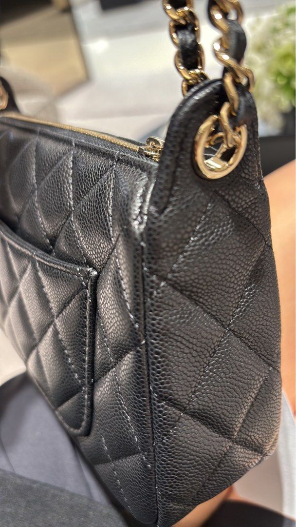 Chanel 26A clutch on chain in black carviar and LGHW model AP4704 (Category: Bags & Wallets) located in Singapore. Submitted by kelly63chong (Listing ID 1438006273, Image 5). Description: - Authentic Chanel chain wallet - Classic quilted caviar leather - Features a chain strap - Comes with original box, dust bag, and receipt - Perfect for everyday or special occasions - Purchased in Singapore.