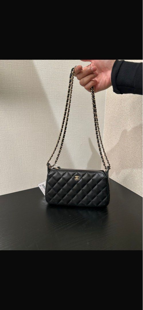 Chanel 26A clutch on chain in black carviar and LGHW model AP4704 (Category: Bags & Wallets) located in Singapore. Submitted by kelly63chong (Listing ID 1438006273, Image 7). Description: - Authentic Chanel chain wallet - Classic quilted caviar leather - Features a chain strap - Comes with original box, dust bag, and receipt - Perfect for everyday or special occasions - Purchased in Singapore.