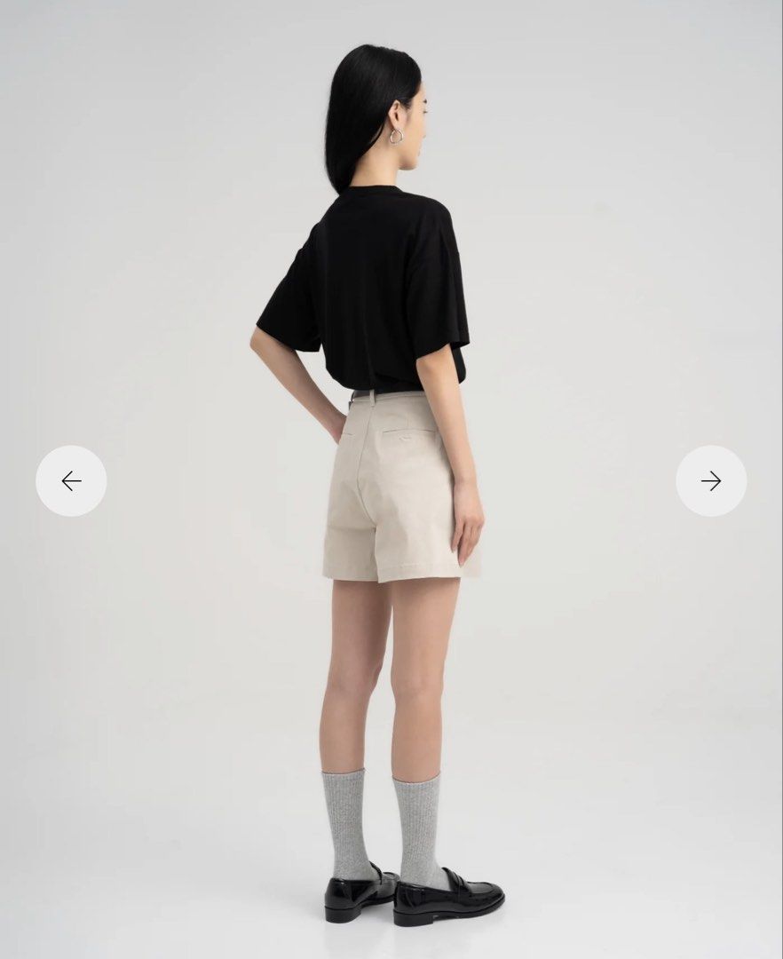Cotton Twill Pleat Shorts - Sandstone (Category: Shorts) located in Singapore. Submitted by vantyw (Listing ID 1438845843, Image 3). Description: - High-rise silhouette - Front pleat for added structure and shape - Side pockets for everyday practicality - Structured, mid-weight fabric with gentle stretch.