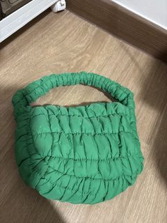 Green puffy hand bag