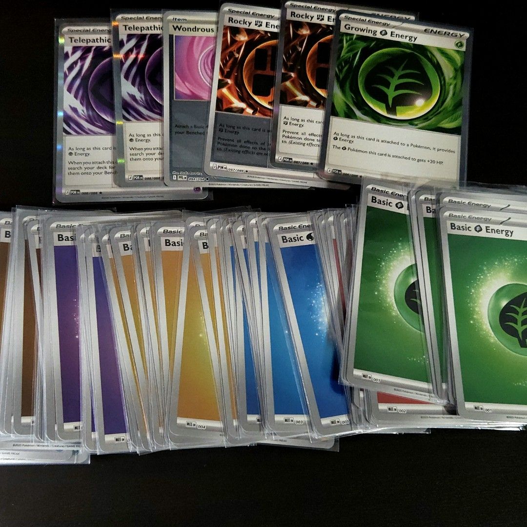 Basic Holo or Special Energy Cards Bundle (Category: Raw Cards) located in Singapore. Submitted by yummiv (Listing ID 1439917304, Image 1). Description: - Bundle of Pokemon TCG Energy Cards - Includes various Basic Energy types - Features Special Energy cards (e.g., Telepathic, Wondrous, Rocky, Growing) Each $1 Take 12 for $10.