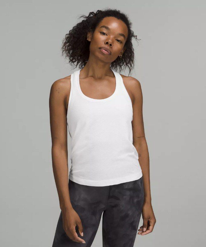 Lululemon Swiftly Tech Tank 2.0 Size 4 (Category: Activewear) located in Singapore. Submitted by chicgirlfriend (Listing ID 1440833739, Image 4). Description: Lululemon Swiftly Tech Racerback Tank 2.0 Waist Length Size 4 Colour: Strawberry milkshake pink Worn only 1-2x Note: Model pic is wearing white, item on sale is in pastel pink. Price includes free door to door SPX delivery .