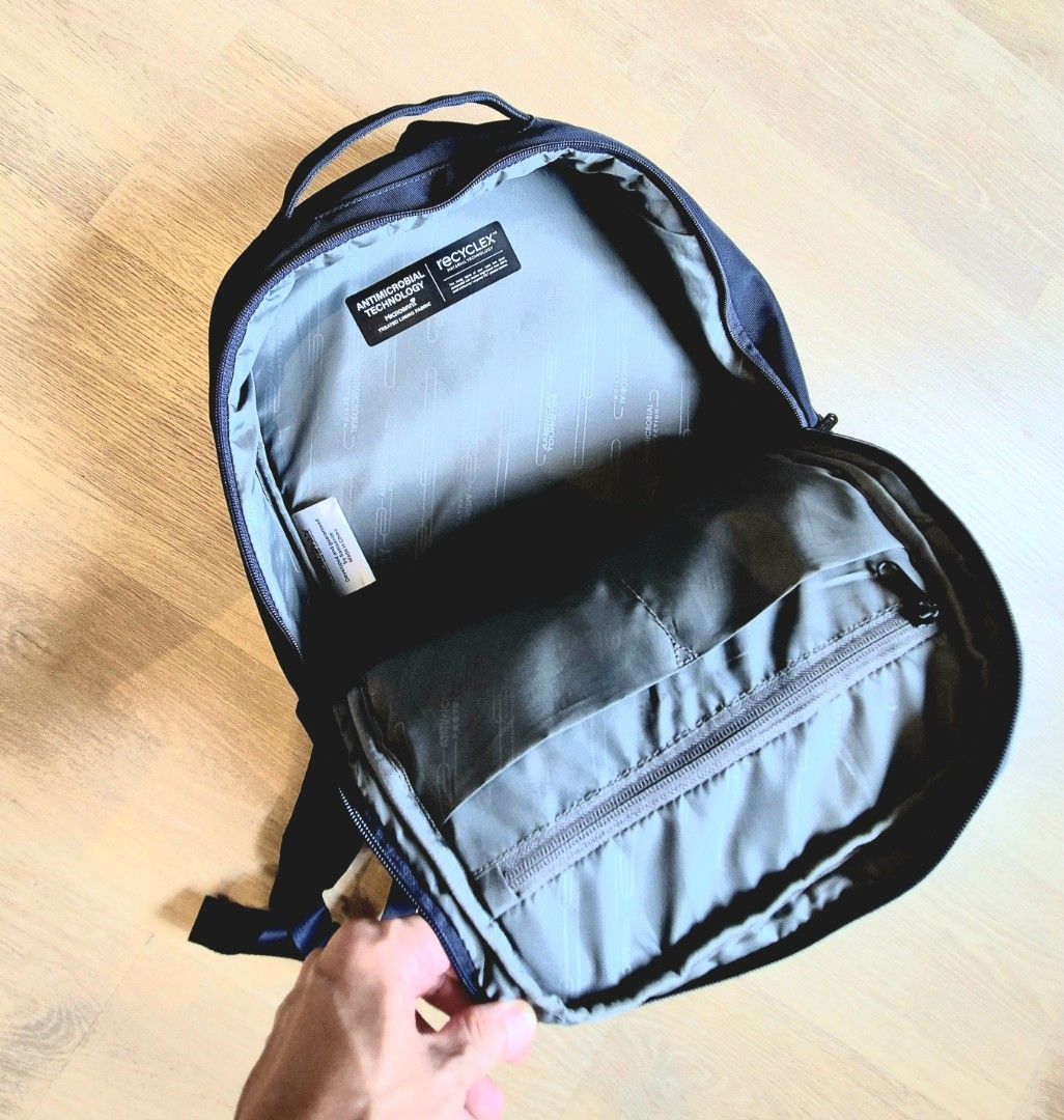 American Tourister RUBIO Navy Blue Laptop Backpack (Category: Backpacks) located in Singapore. Submitted by gleeli (Listing ID 1440966980, Image 6). Description: - Original American Tourister RUBIO Navy blue backpack - Original Price SG$95+ - Antimicrobial technology - Made with Recyclex fabric - Main compartment, front & side pockets - Padded back and straps for comfort - Zippers in good working condition - Interior is very clean.