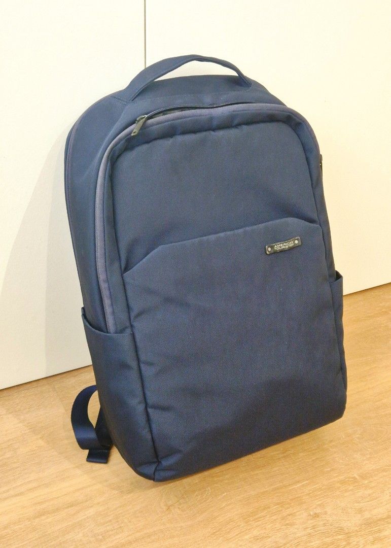 American Tourister RUBIO Navy Blue Laptop Backpack (Category: Backpacks) located in Singapore. Submitted by gleeli (Listing ID 1440966980, Image 1). Description: - Original American Tourister RUBIO Navy blue backpack - Original Price SG$95+ - Antimicrobial technology - Made with Recyclex fabric - Main compartment, front & side pockets - Padded back and straps for comfort - Zippers in good working condition - Interior is very clean.