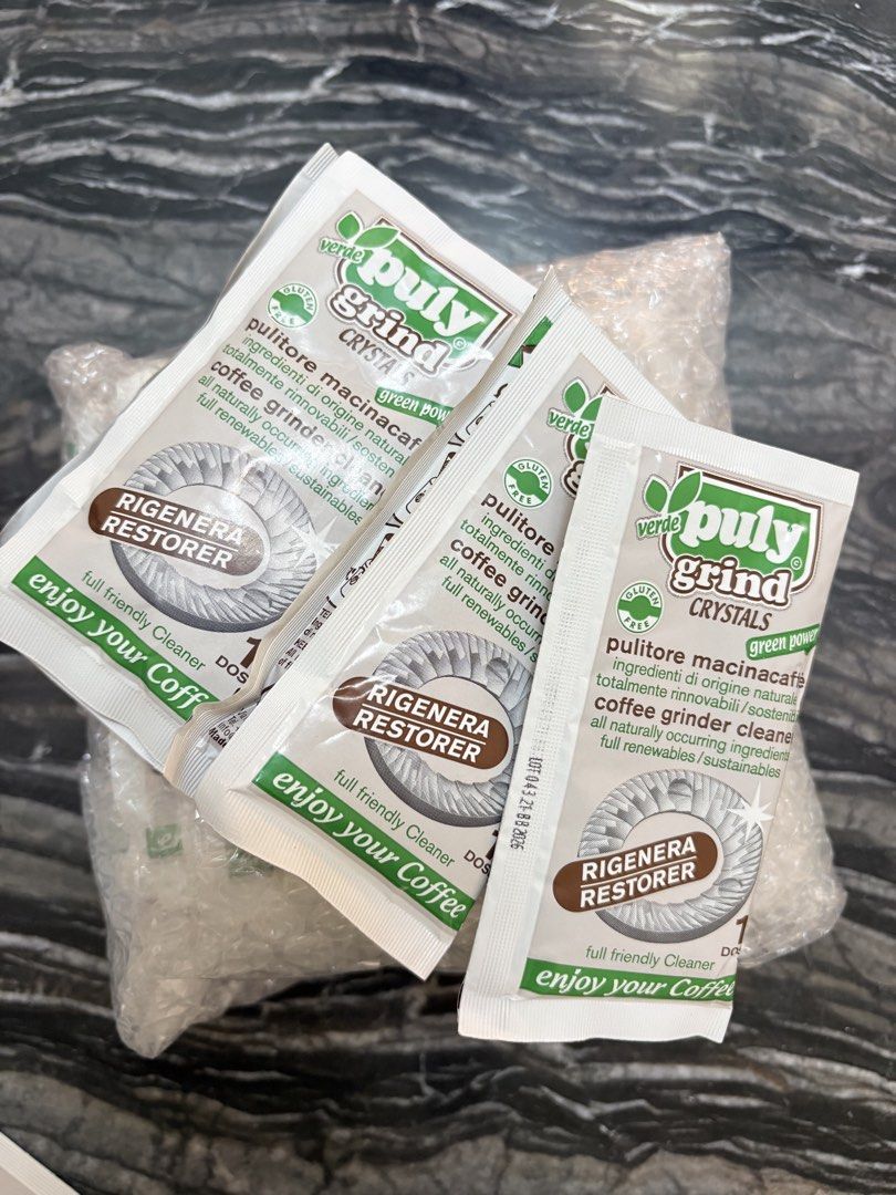 Puly Grind Crystals Coffee Grinder Cleaner (Category: Coffee Machines & Makers) located in Singapore. Submitted by declutter_kondo (Listing ID 1436165257, Image 2). Description: $15 for 10 sachets, $1.50 each. Tracked shipping additional $2.30 per shipment. - Brand new Puly Grind Crystals coffee grinder cleaner. - Includes multiple single-dose packets. - Cleans your coffee grinder effectively. - Ensures the best tasting coffee. Recently bought di