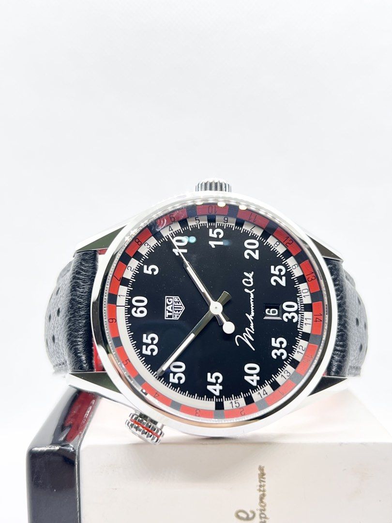 Pre Owned Tag Heuer Carrera “Mohammed Ali” WAR2A11 Black Dial Automatic Steel Casing Leather ( Dec 16 ) (Category: Watches) located in Singapore. Submitted by brightime (Listing ID 1436403453, Image 1). Description: Pre Owned Tag Heuer Carrera “Mohammed Ali” WAR2A11 Black Dial Automatic Steel Casing Leather ** Pre-Owned ** ** Unpolished Set, Very Mint Condition ** Model : WAR2A11.FC6337 Also known as : Carrera “Mohammed Ali” Case size : 43mm Dial
