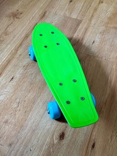 Bright Green Penny Board Style Skateboard with Blue Wheels