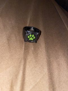 Black Ring with Green Paw Print and ZAG Logo