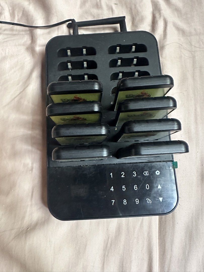 Wireless Restaurant Pager System with 8 Pagers (Category: Office & Business Technology) located in Singapore. Submitted by nammie1 (Listing ID 1444705284, Image 3). Description: - Wireless calling system perfect for restaurants & cafes. - Includes 1 base station and 8 pagers. - Base station equipped with a keypad for easy signal sending. - Efficiently manage customer flow and service. -Calibrated to the buzzers -Replaceable paper labels (not incl