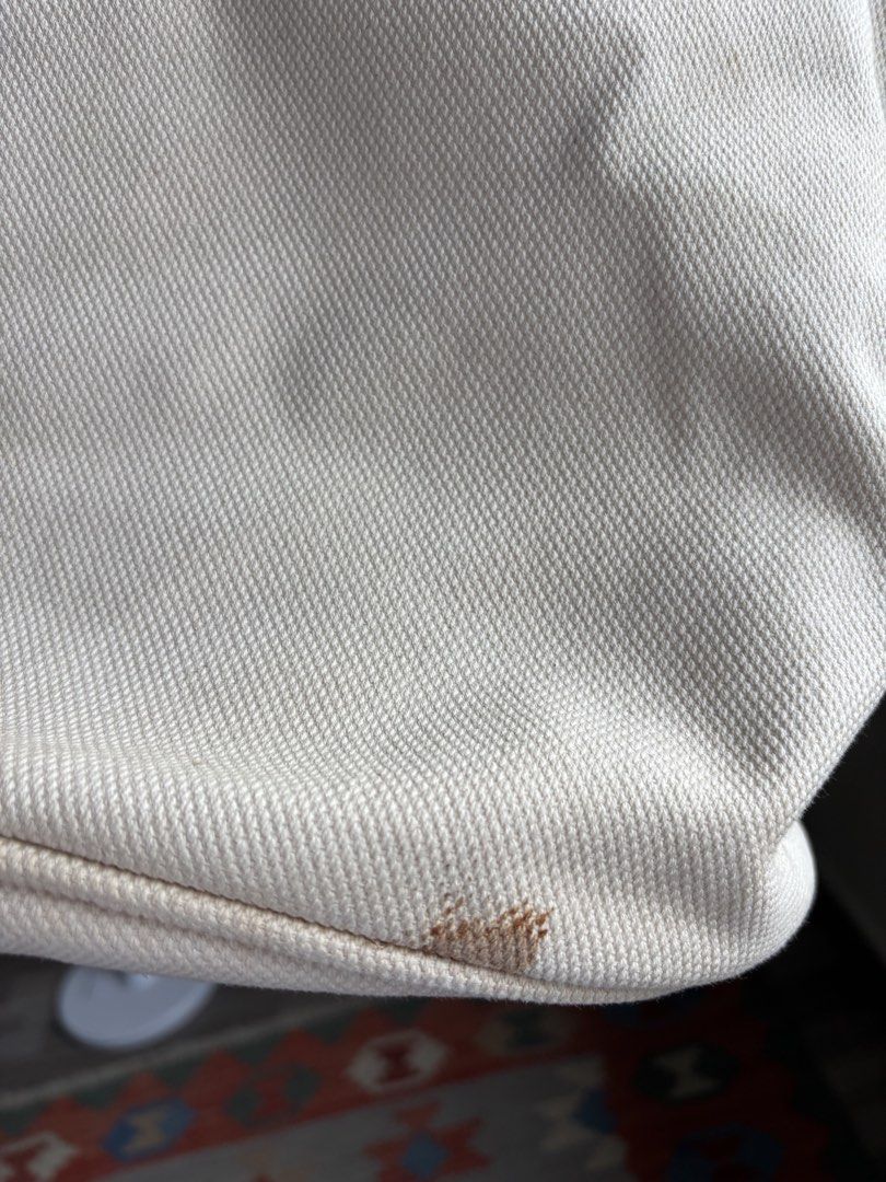 Prada Canvas bucket Tote Bag (Category: Bags & Wallets) located in Singapore. Submitted by forabargain (Listing ID 1444880004, Image 3). Description: - Authentic Prada cream canvas tote bag - Iconic Prada Milano triangle logo - Gold-tone zipper closure - Interior plaid lining with zippered pocket - Sturdy handles - Perfect for everyday use Selling as it is - not for fussy buyers..