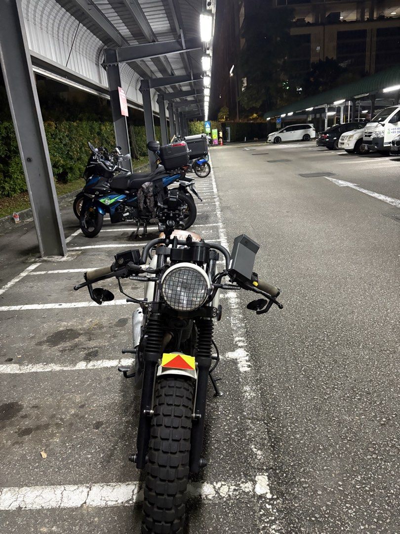 Black Motorcycle Handlebars for Cafe Racer/Scrambler (Category: Motorcycle Accessories) located in Singapore. Submitted by rddas (Listing ID 1445356376, Image 5). Description: I used this handlebar for about 6 months and revert back to the original due to its strain posture. It’s now stored under my bed packed inside. Slightly Negotiable Ai Generated - Black motorcycle handlebars - Cafe racer / Scrambler style - Slight rise and sweep - Straight e