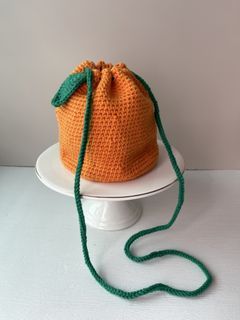 Hand-knitted Orange Drawstring Bag with Leaf Detail