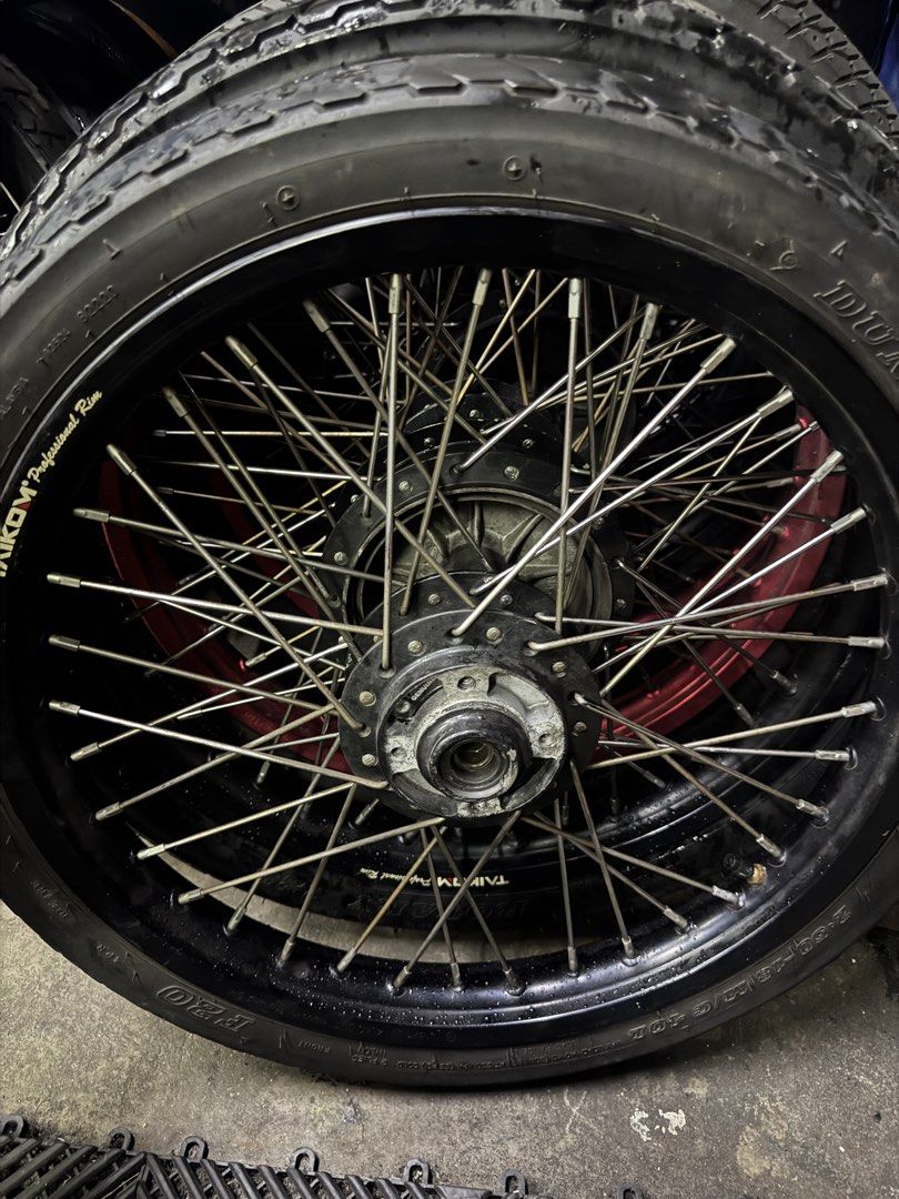 Taikom Rxz Rims (Category: Motorcycle Accessories) located in Singapore. Submitted by tosaimcmuffin (Listing ID 1445737395, Image 1). Description: Taikom hitam for rxz Spokes are fine but rusty abit so respoke if want to . hub ade paint chips which can be seen rims itself is fine. comes with tayar but depan belakang botak sikit . can help respoke,change tyres and fix wtv uw but extra cost and need deposit. just pm if wanna discuss anyt. once used
