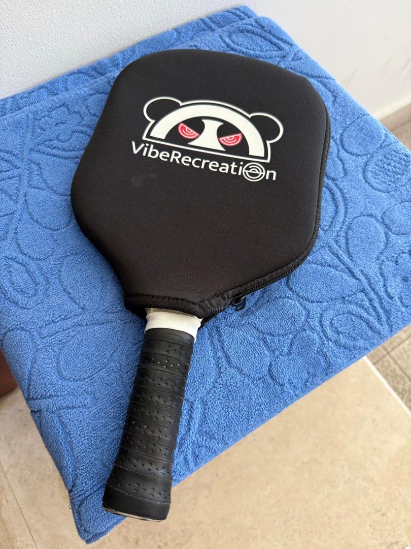 Pickleball Paddle with Cover (Category: Racket & Ball Sports) located in Singapore. Submitted by icevanillalatte (Listing ID 1446204989, Image 2). Description: - Bought from Amazon for 130 - Panda pickleball paddle - Carbon fiber construction - Includes protective cover .