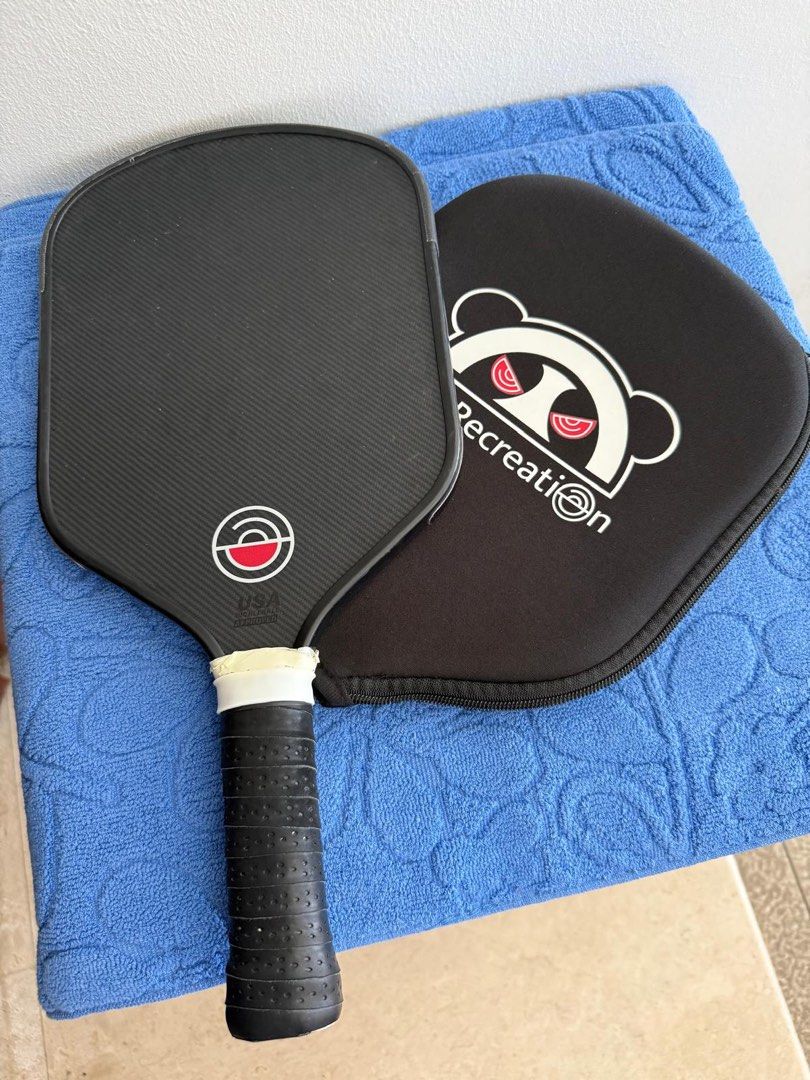 Pickleball Paddle with Cover (Category: Racket & Ball Sports) located in Singapore. Submitted by icevanillalatte (Listing ID 1446204989, Image 3). Description: - Bought from Amazon for 130 - Panda pickleball paddle - Carbon fiber construction - Includes protective cover .