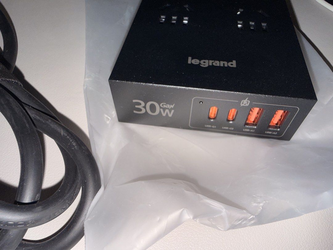 Legrand 30W GaN Power Strip with USB-C and USB-A Ports (Category: Electrical, Adaptors & Sockets) located in Singapore. Submitted by wwwwww111244 (Listing ID 1446469048, Image 2). Description: - Legrand 30W GaN Power Strip - 2 AC Outlets - 4 USB Ports (2 USB-C, 2 USB-A) - Charge multiple devices simultaneously - Compact and portable design - UK Plug included.
