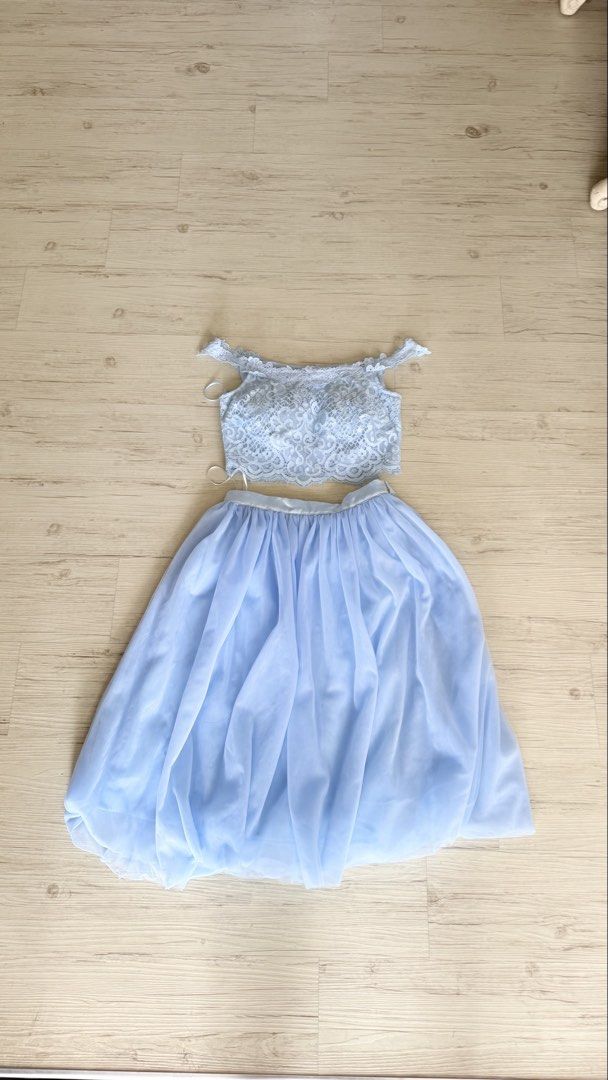 Light Blue Lace Crop Top and Tulle Skirt Set (Category: Sets or Coordinates) located in Singapore. Submitted by icedmatchaa (Listing ID 1446393670, Image 1). Description: - Light blue two-piece set - Lace off-the-shoulder crop top - Flowy tulle midi skirt with comfortable waistband - Ideal for prom, parties and special occasions - Looks beautiful when worn together.
