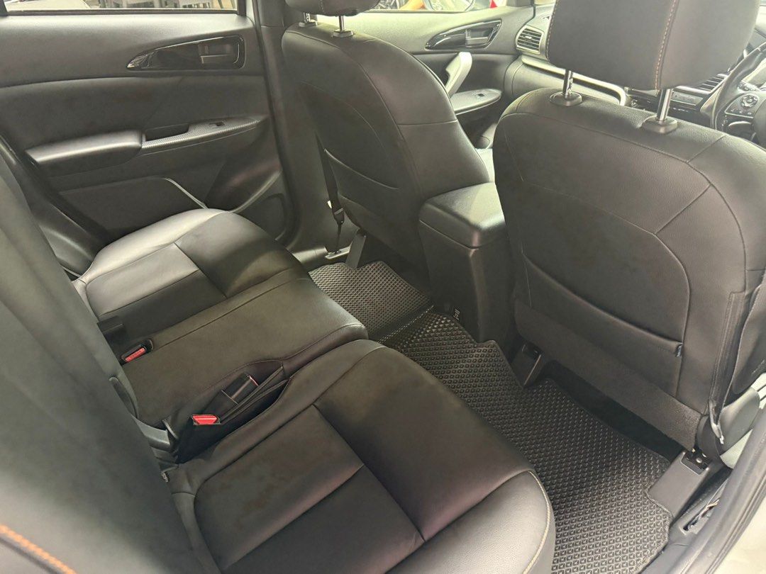 Mitsubishi Eclipse Cross 1.5T Classic (A) (Category: Used Cars) located in Singapore. Submitted by kyra-ktmotoring (Listing ID 1446567720, Image 7). Description: FULLY AGENT SERVICED UP TILL DATE ✅WEAR AND TEAR FULLY DONE UP ✅ENGINE AND GEARBOX WARRANTY COVERED TILL END OF COE ✅ 1.98% INTEREST RATE ✅HIGH LOAN APPROVAL RATE ✅ $0 DRIVEAWAY / FULL LOAN WELCOME Silver Mitsubishi Eclipse Cross. SUV with black rims. Spacious boot. Great for families or
