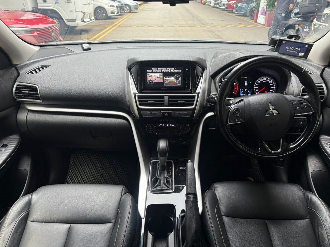 Mitsubishi Eclipse Cross 1.5T Classic (A) (Category: Used Cars) located in Singapore. Submitted by kyra-ktmotoring (Listing ID 1446567720, Image 6). Description: FULLY AGENT SERVICED UP TILL DATE ✅WEAR AND TEAR FULLY DONE UP ✅ENGINE AND GEARBOX WARRANTY COVERED TILL END OF COE ✅ 1.98% INTEREST RATE ✅HIGH LOAN APPROVAL RATE ✅ $0 DRIVEAWAY / FULL LOAN WELCOME Silver Mitsubishi Eclipse Cross. SUV with black rims. Spacious boot. Great for families or