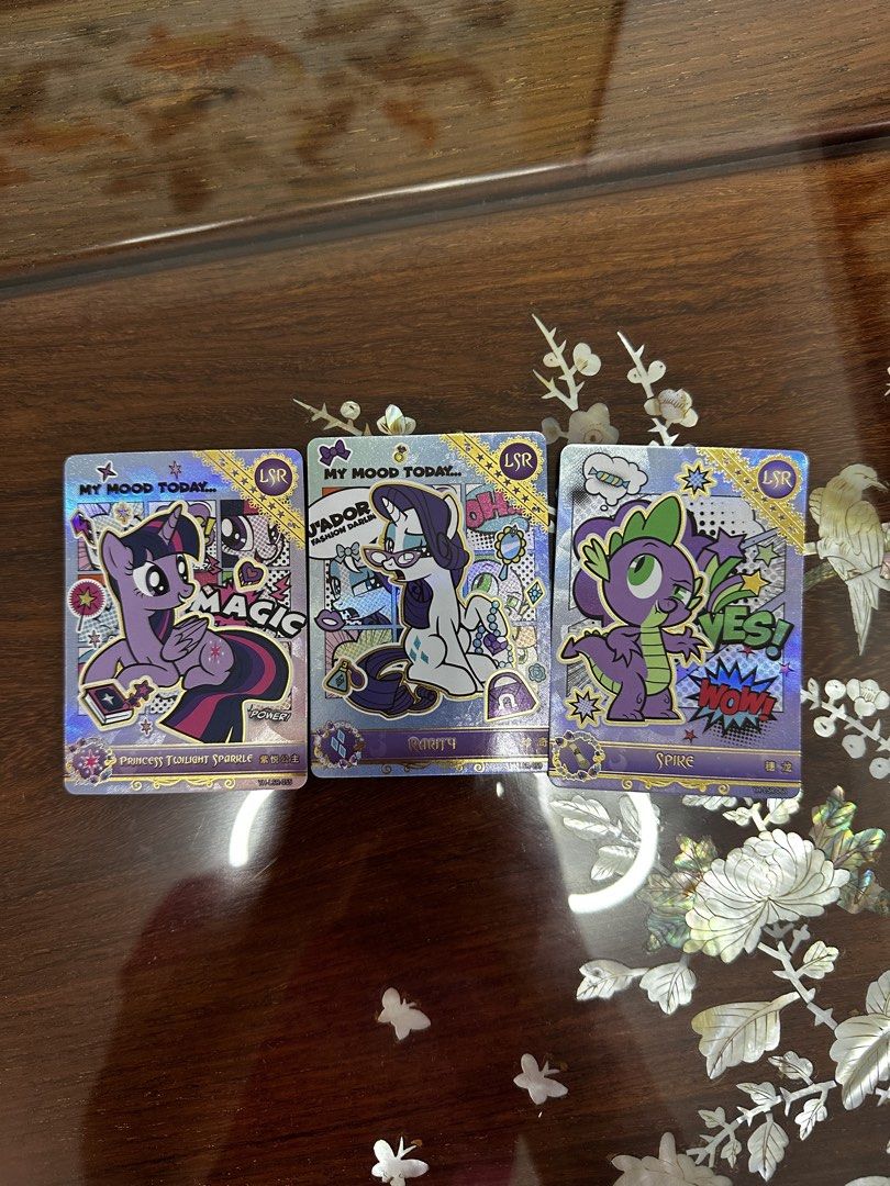My Little Pony LSR Cards - Twilight Sparkle, Rarity, Spike (Category: Raw Cards) located in Singapore. Submitted by crystallee1357 (Listing ID 1446827335, Image 1). Description: - Set of 3 My Little Pony LSR collectible cards - Features Princess Twilight Sparkle, Rarity, and Spike - Fun and unique designs - Ideal for any My Little Pony fan.