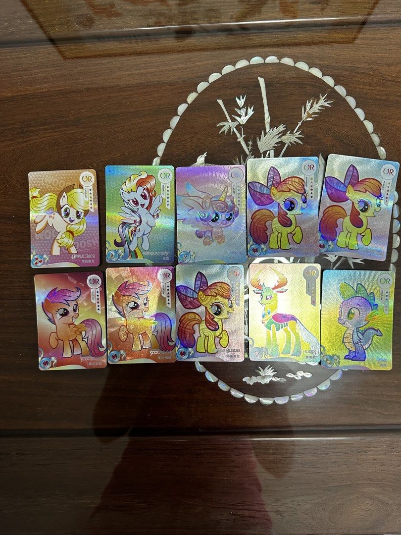 My Little Pony UR Cards Collection - Set of 10 (Category: Raw Cards) located in Singapore. Submitted by crystallee1357 (Listing ID 1446826734, Image 1). Description: - Set of 10 My Little Pony UR cards - Holographic finish - Features various characters - Ideal for collectors and fans - Rare find!$3 per piece.
