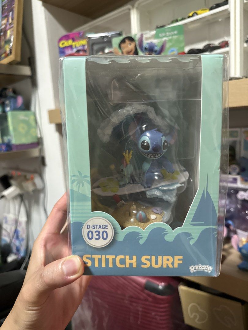 Disney Stitch Surf D-Stage 030 Beast Kingdom Figure (Category: Toy Figures) located in Singapore. Submitted by koks96 (Listing ID 1442119268, Image 1). Description: - Beast Kingdom D-Stage 030 Stitch Surf figure - Approximately 6 inches tall - Highly detailed exterior with professional paintwork - Includes official logo tag - Ideal collectible for any Stitch enthusiast.
